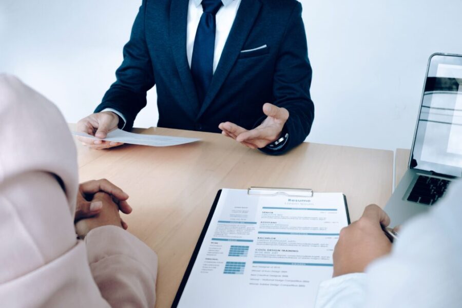 business-situation-job-interview-concept-job-seeker-present-resume-managers(1)